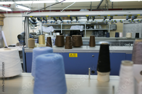 Industrial knitting machine at work