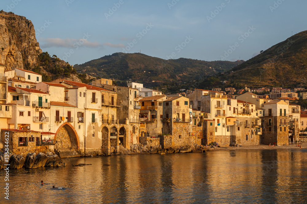 Sunset in the old town of Cefalu, Sicily island, Italy