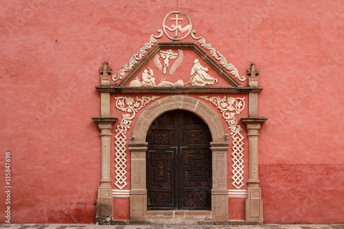 Door on the typical colonial church in Huichapan, Mexico