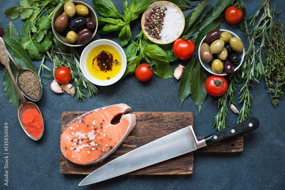 Fresh raw salmon steaks with herbs Fresh raw salmon steaks with herbs