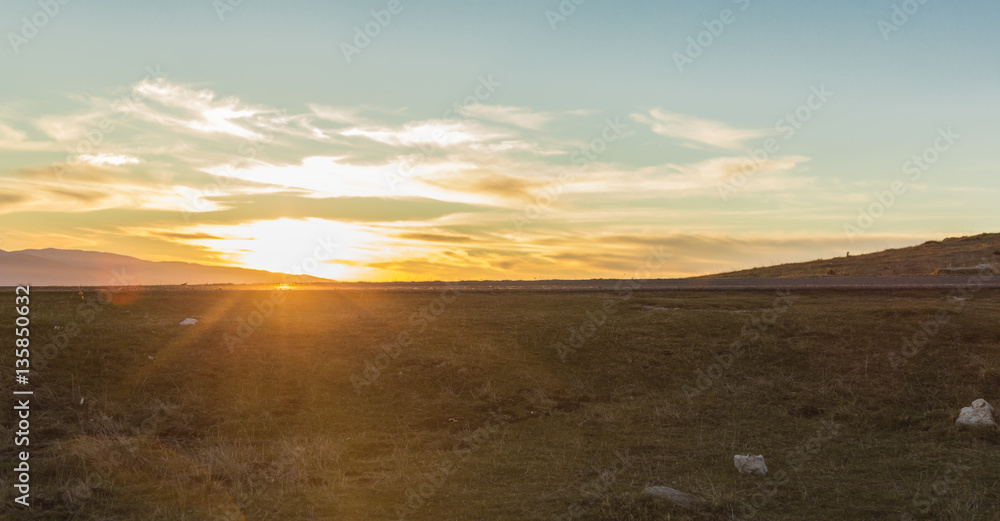 Panoramic dramatic sunset sky from the top of Gran Sasso mountain in Abruzzo, Italy Panoramic dramatic sunset sky from the top of Gran Sasso mountain in Abruzzo, Italy