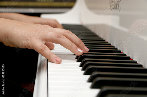 Close up piano, white and black keyboard
