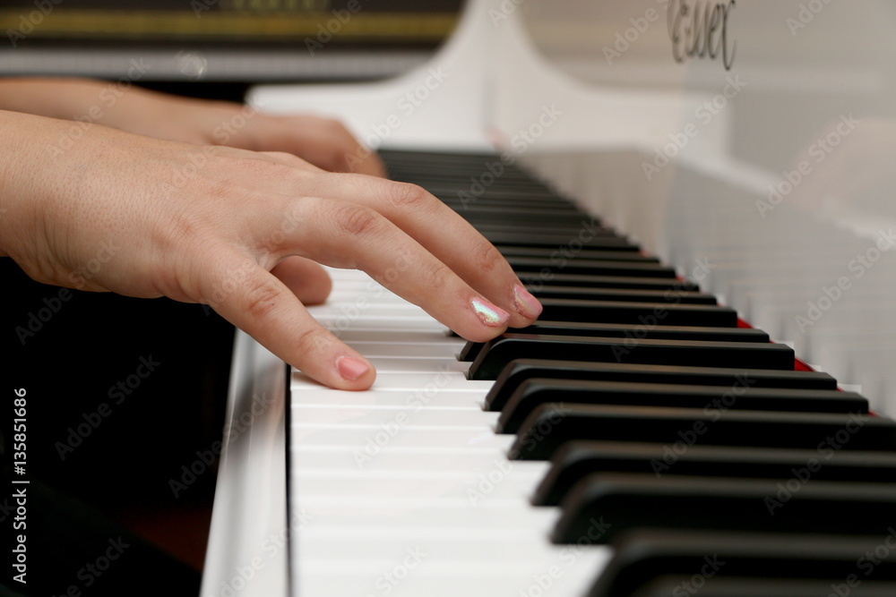 Fototapeta premium Close-up piano, white and black keyboard