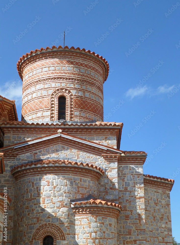 Saint Clement Church, an impressive stone church against vibrant blue sky, Ohrid of Macedonia 
