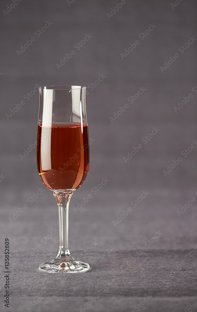 Wineglass of Wine on Grey Background Wineglass of Wine on Grey Background