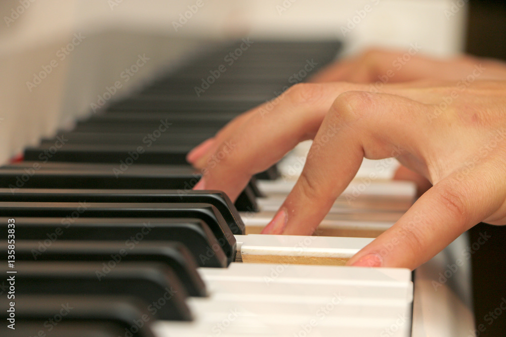 Fototapeta premium Close-up piano, white and black keyboard