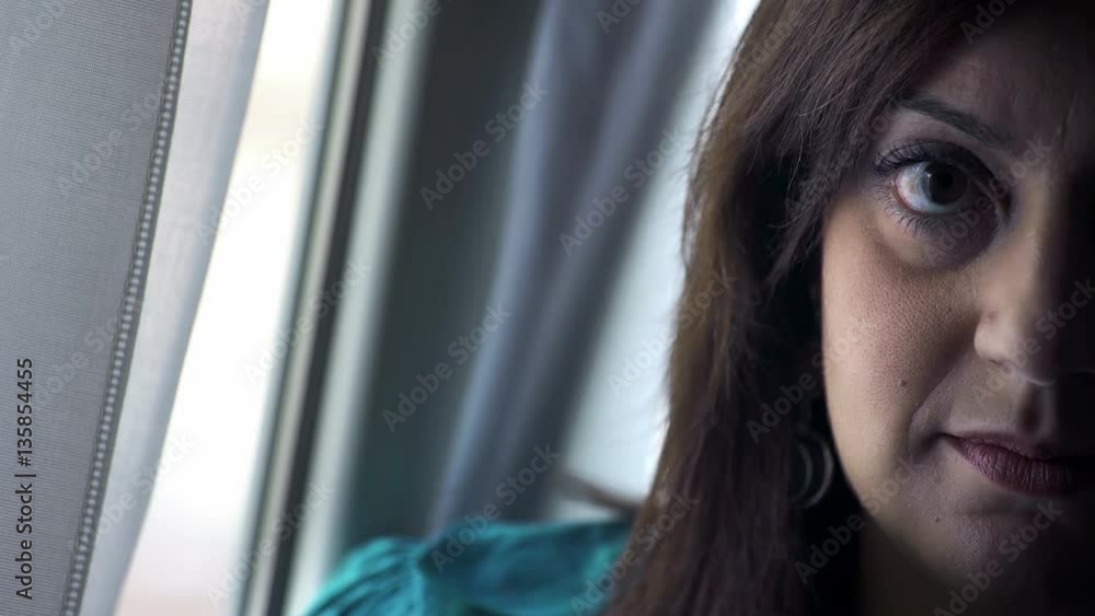 serious woman looks at the camera serious woman looks at the camera