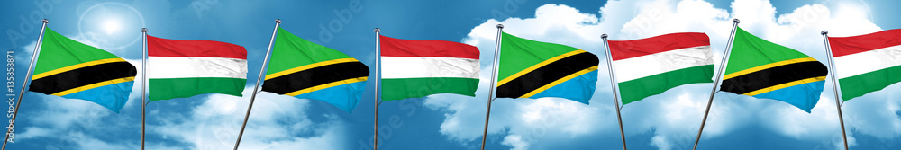 Tanzanian flag with Hungary flag, 3D rendering Tanzanian flag with Hungary flag, 3D rendering