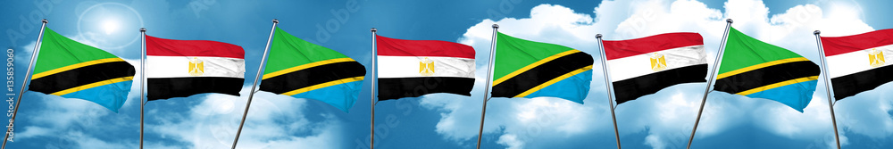 Tanzanian flag with egypt flag, 3D rendering Tanzanian flag with egypt flag, 3D rendering
