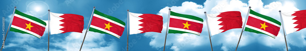Suriname flag with Bahrain flag, 3D rendering Suriname flag with Bahrain flag, 3D rendering