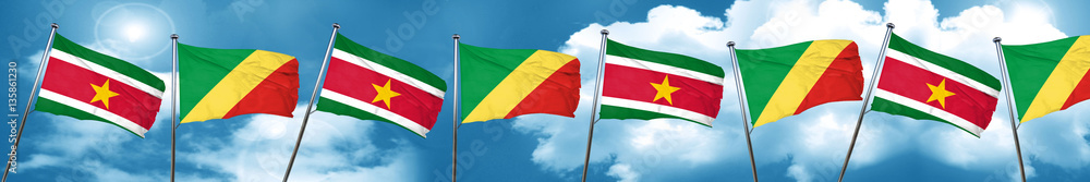 Naklejka premium Suriname flag with congo flag, 3D rendering