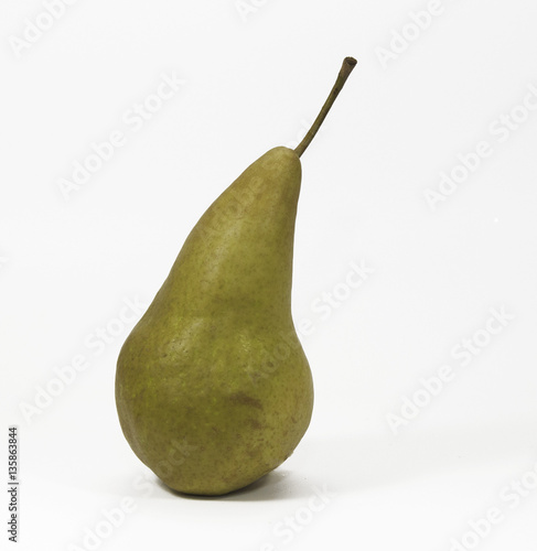 Single pear against a white background