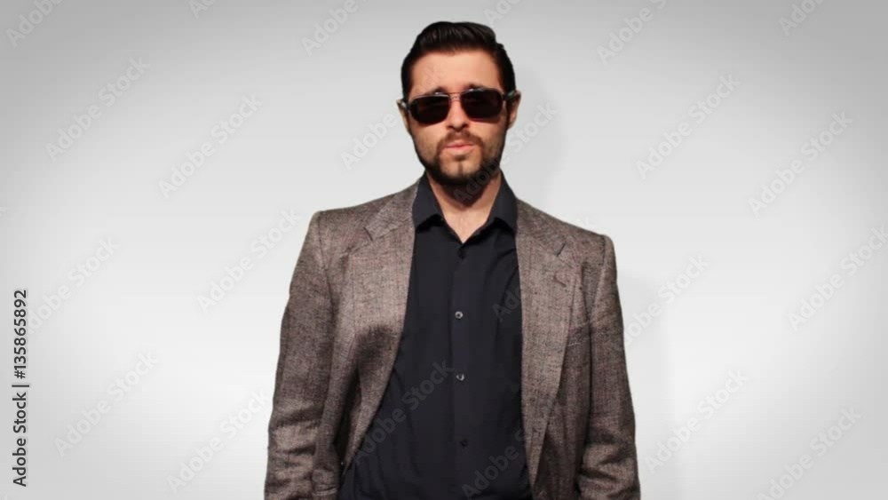 Confident Hipster Millenial Man in suit + Green Screen Confident Hipster Millenial Man in suit + Green Screen