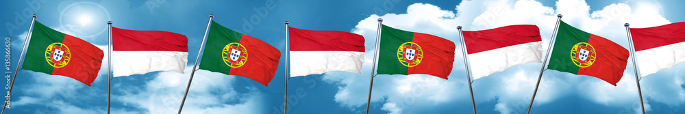 Portugal flag with Indonesia flag, 3D rendering Portugal flag with Indonesia flag, 3D rendering