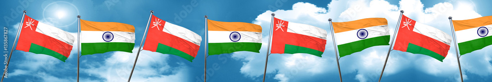 Oman flag with India flag, 3D rendering Oman flag with India flag, 3D rendering