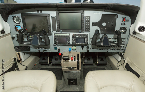 Interior single piston aircraft. Small private aircraft interior and dashboard. matrix