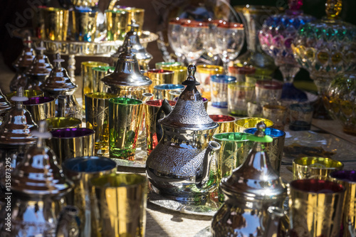 Arabic teapot, various glass vessels with many colors, typical s