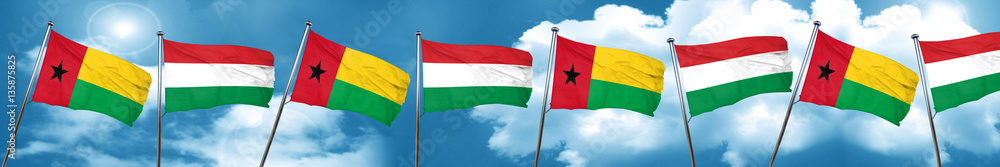Guinea bissau flag with Hungary flag, 3D rendering Guinea bissau flag with Hungary flag, 3D rendering