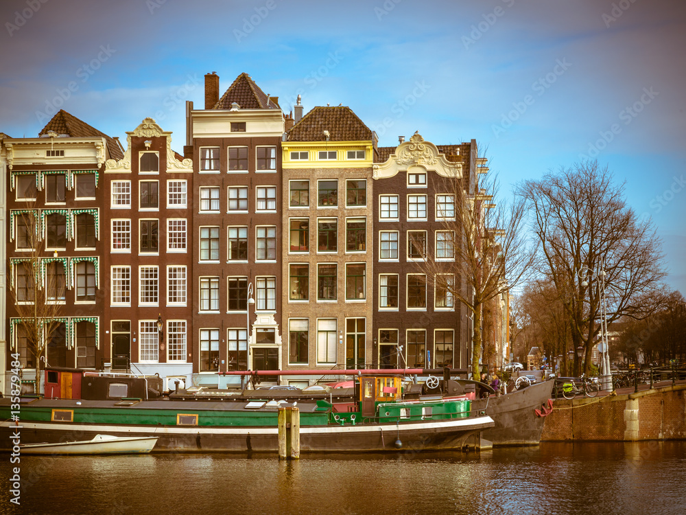 Canal houses in retro look on the Amstel Amsterdam