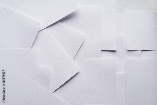 Abstract composition with sheets of office paper. Background image.