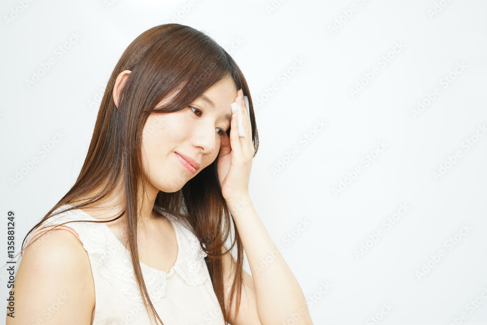 Young woman skin caring in the room Young woman skin caring in the room