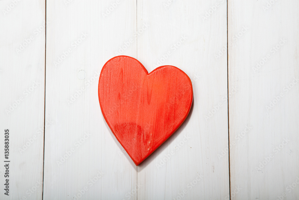 Holidays gift and heart on a white background. Holidays gift and heart on a white background.