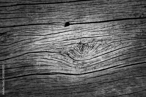 Pattern cracked old wooden background.