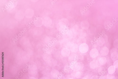 Abstract defocused lights pink tone lights background.