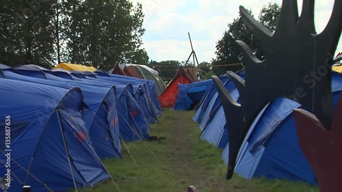 blue shelter tents in the camp photo