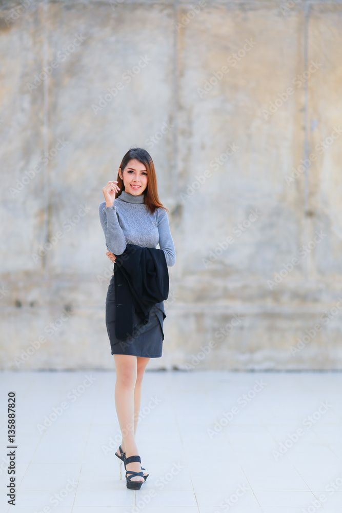Asian people young businesswoman standing, The beautiful model business women hold suit and smiling