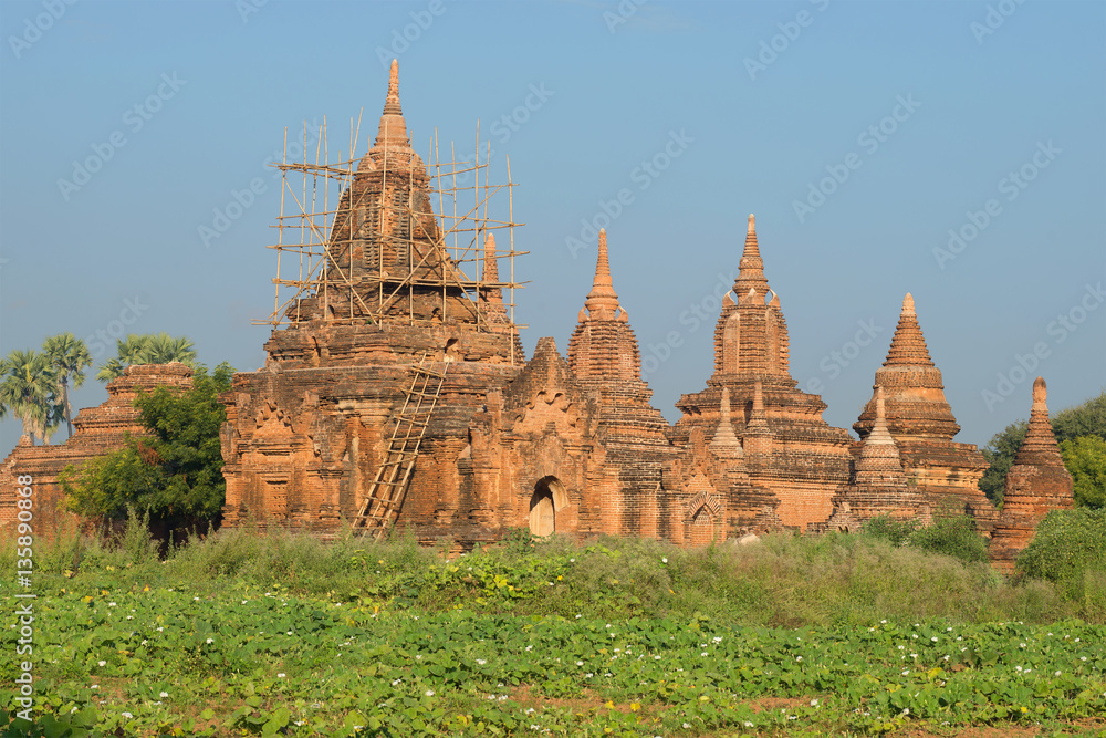 Ancient Buddhist temple complex on a sunny morning. Bagan, Myanmar