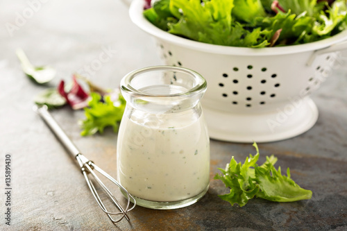 Homemade ranch dressing in a small jar photo