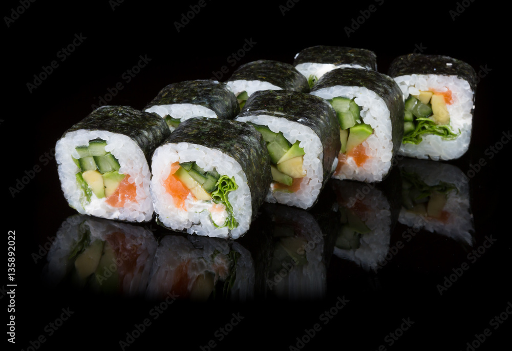 Japanese rolls on black background Japanese rolls on black background