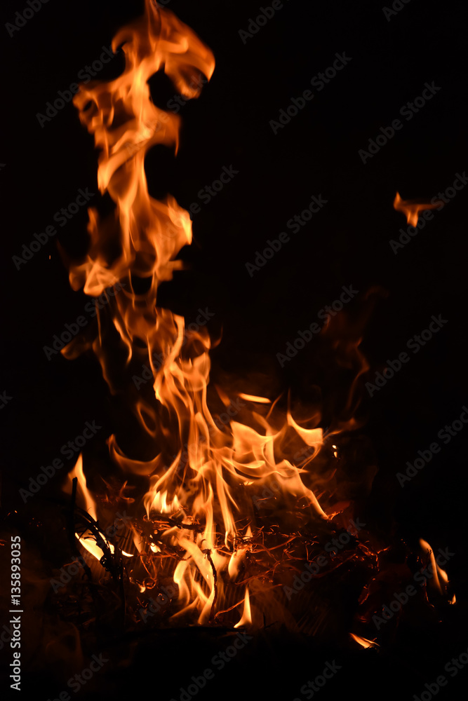 Burning fire background detail close up on black background. Burning fire background detail close up on black background.
