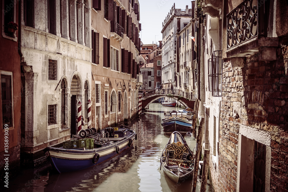 Vintage scenic Venice city. / Retro vintage view at water street in Venice, touristic attraction in Europe, italy.