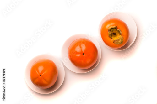 Persimmon fruit isolated on white background.