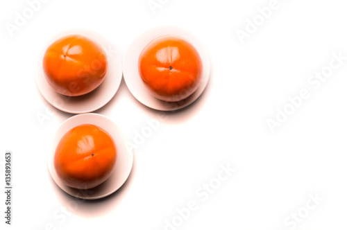 Persimmon fruit isolated on white background.