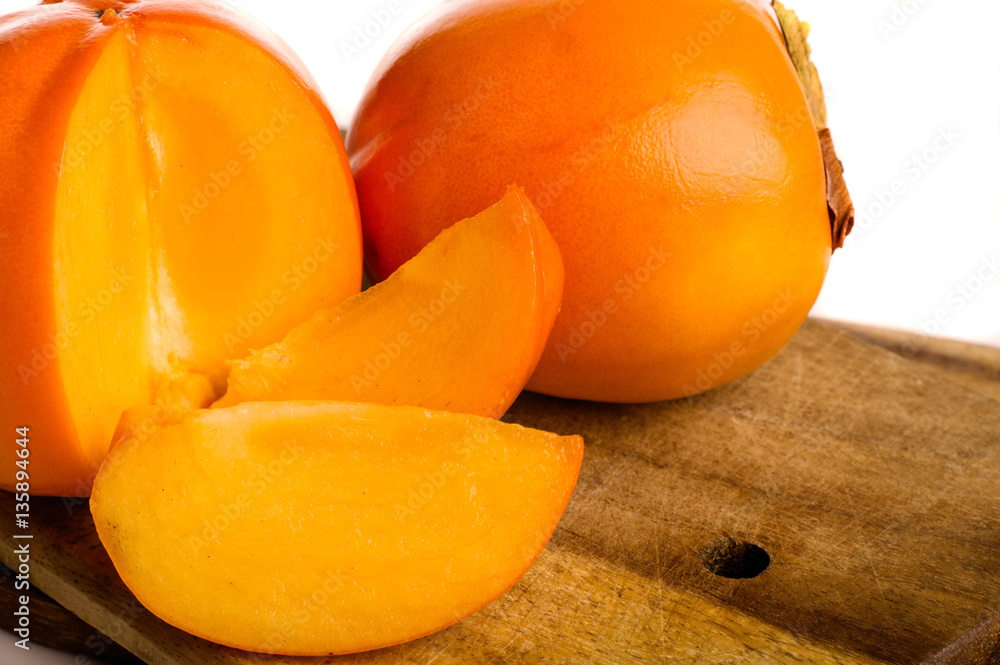 Persimmon fruit isolated on white background.