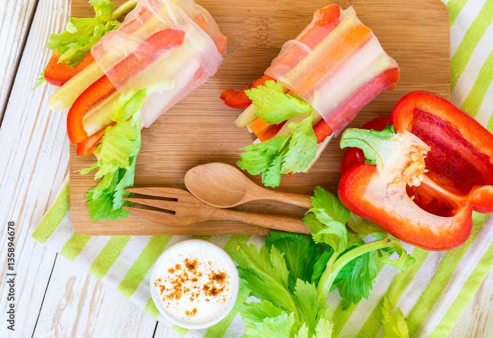Spring roll with vegetables and white sour cream souce Spring roll with vegetables and white sour cream souce
