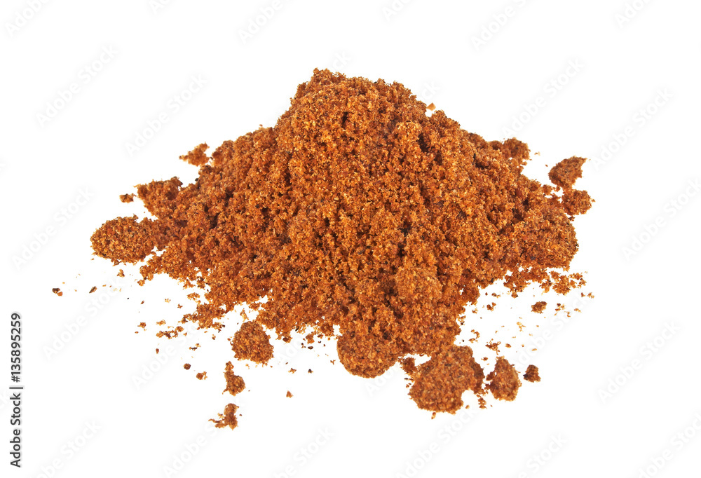Pile of nutmeg powder isolated on white background Pile of nutmeg powder isolated on white background