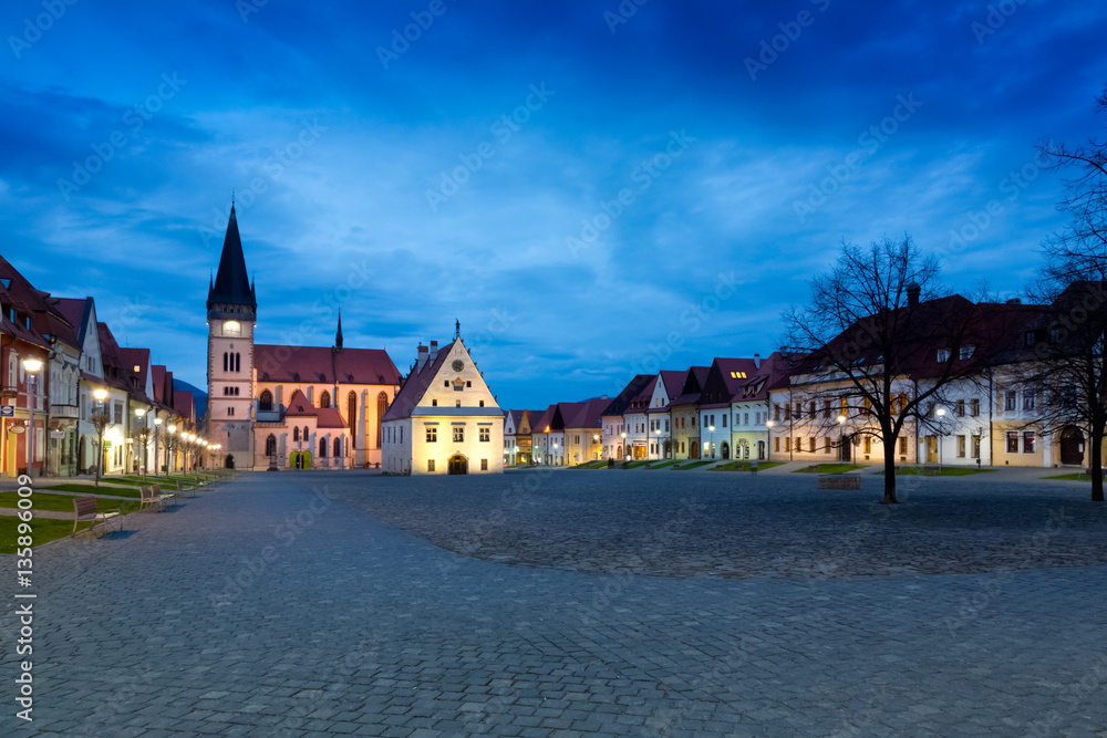 Naklejka premium evening historical square Badejov, Slovakia