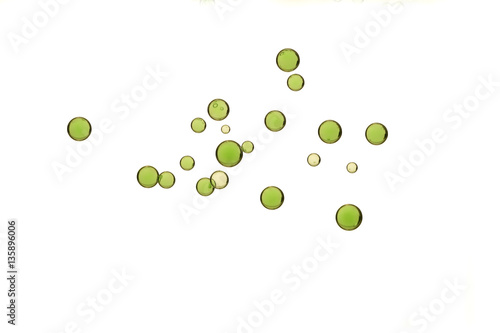 Light green fizz bubbles isolated over a white backgrond
