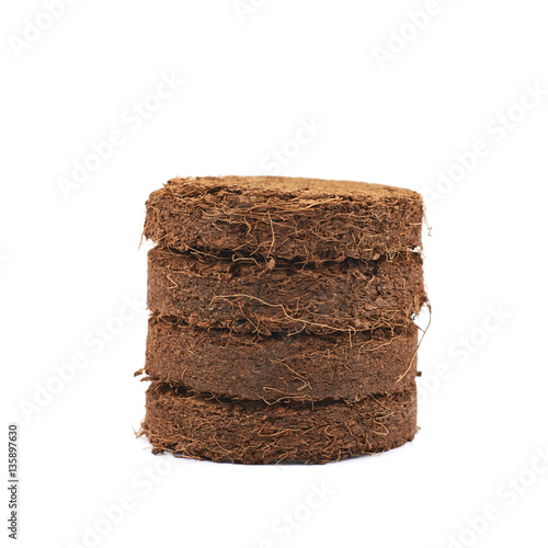 Compressed compost tablet isolated