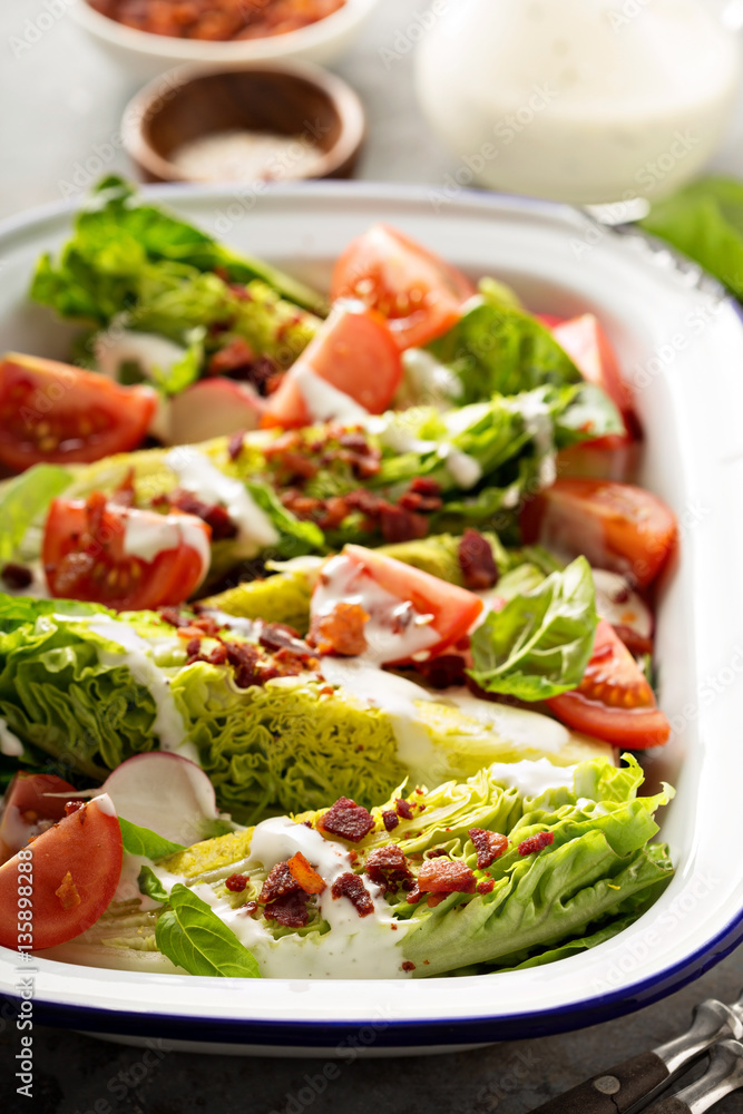 Wedge salad with baby lettuce and tomatoes Wedge salad with baby lettuce and tomatoes