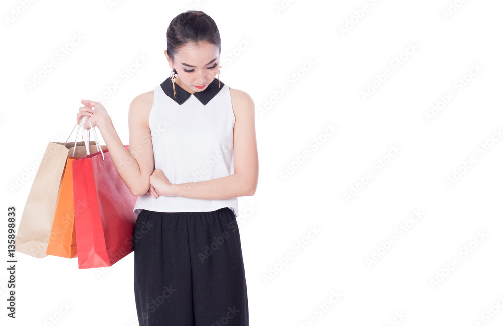 women holding shopping bags in her hand with a copy space,isolated on white background women holding shopping bags in her hand with a copy space,isolated on white background