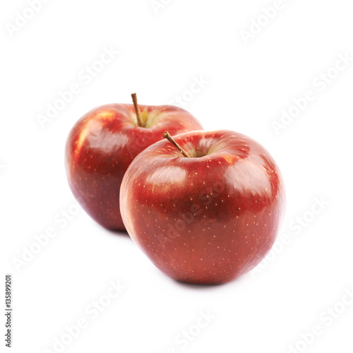 Two ripe red apples isolated