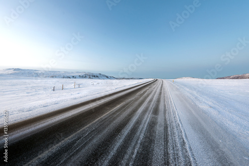 Driving a snowy road on winter iceland