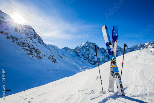 Ski in winter season, mountains and ski touring backcountry equi