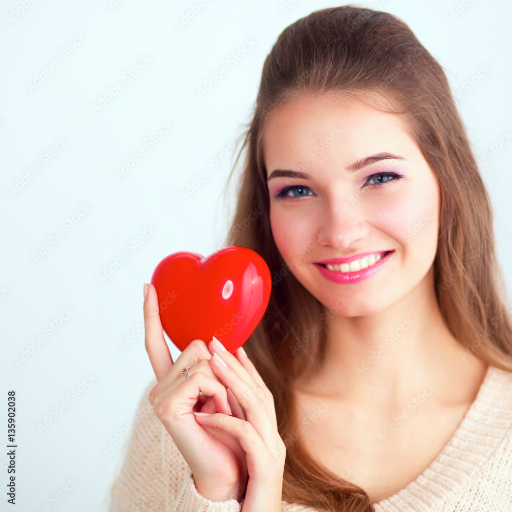 Portrait of beautiful woman hold red heart Portrait of beautiful woman hold red heart