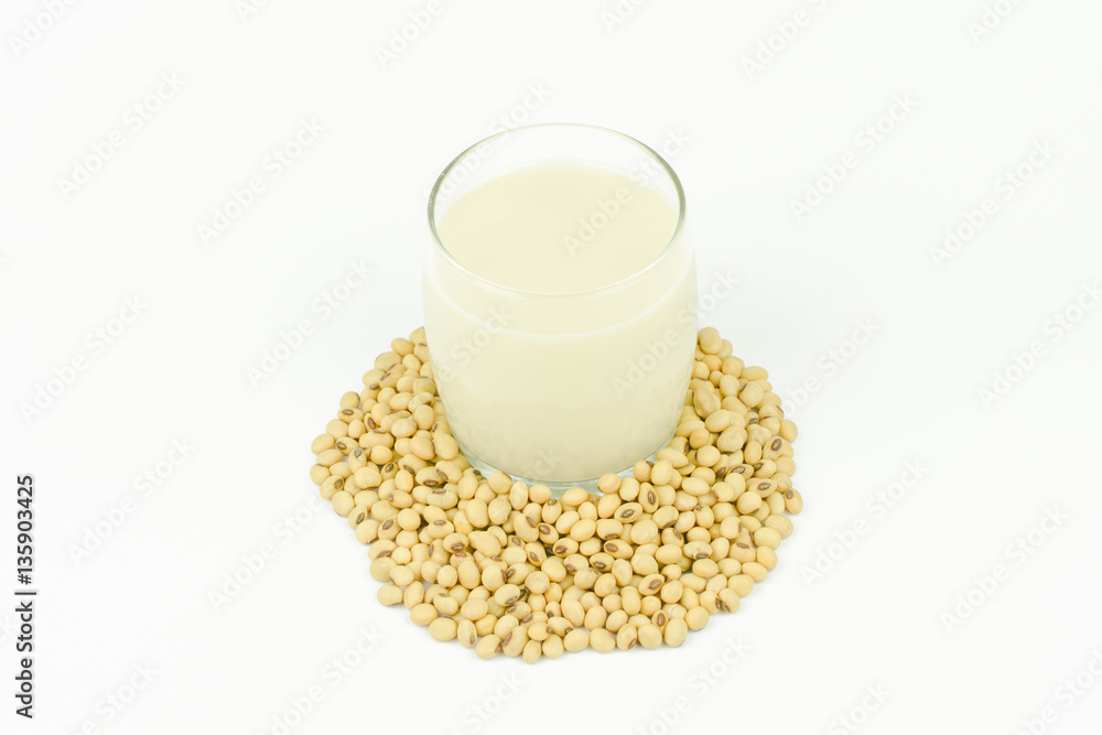 Milk with soy beans on white background. Milk with soy beans on white background.